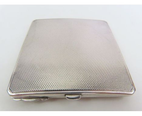 A silver powder compact, by Crisford &amp; Norris &amp; Co, Birmingham 1942, engine turned decorated, approximately 6.2 cm sq
