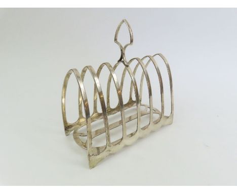 An unusually large silver toast rack, by William Hutton &amp; Sons, Sheffield 1927, approximately 15 cm long, 301 g gross (9.