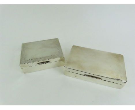 A plain silver cigarette box, with an engine turned smaller example 