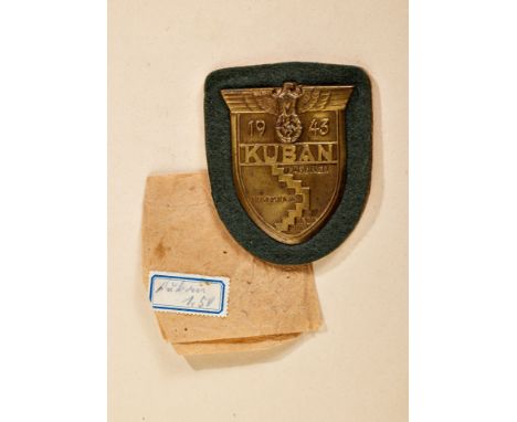 Orden und Ehrenzeichen - Wehrmacht Allgemein : Kuban Schild. Eisenausführung auf Heeresstoff mit rückseitiger Papierabdeckung