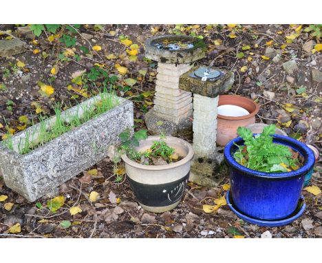A COMPOSITE BRICK EFFECT OCTAGONAL BIRD BATH ON A SEPERATE BASE, height 62cm x diameter 39cm, together with a composite sundi