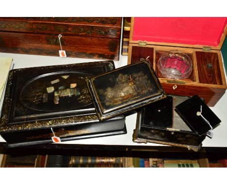 A VICTORIAN PAPIER MACHE TEA CADDY, of rectangular form, the hinged cover with painted and mother of pearl inlaid church deco