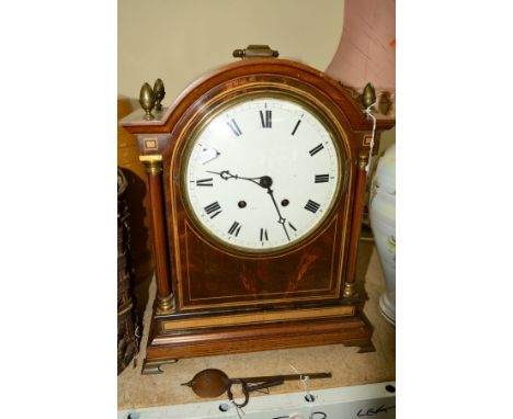 AN EDWARDIAN MAHOGANY AND INLAID BRACKET CLOCK, brass carry handle and acorn finials, enamel dial with Roman numerals, faintl