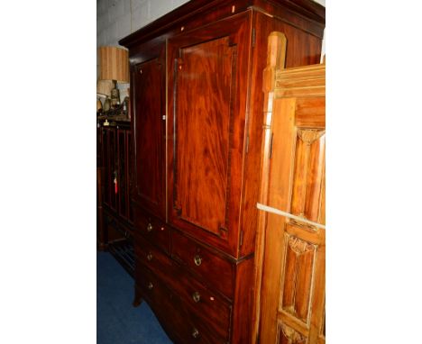 A GEORGIAN MAHOGANY, ROSEWOOD BANDED AND INLAID PANELLED DOUBLE DOOR LINEN PRESS, the top revealing two later shelves (no sli