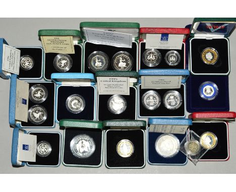 A COLLECTION OF UK SILVER PROOF COINS IN BOXES OF ISSUE, with certificates of authenticity from the Royal Mint, to include 50