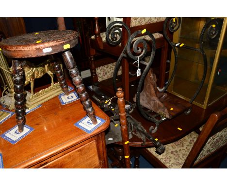 A LATE 19TH CENTURY CARVED MAHOGANY MILKING STOOL, together with a pair of brass horse figures, brass column lamp, wrought ir