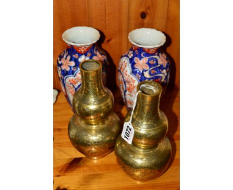 A PAIR OF BRASS DOUBLE GOURD SHADED ORIENTAL VASES, four character mark to base, height 20cm, together with a pair of porcela