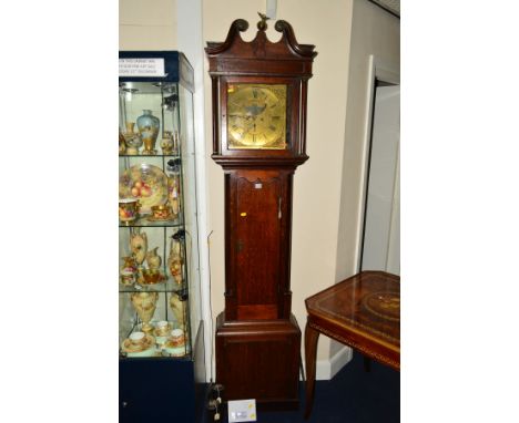 A GEORGE III OAK LONGCASE CLOCK, the broken swan neck pediment with brass rosette mounted scrolls centred by a brass eagle on