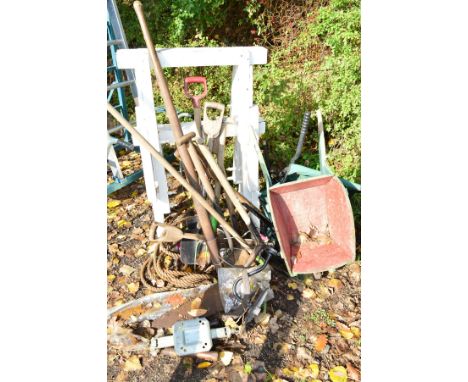 A PAIR OF WHITE PAINTED TRESSEL STANDS, together with various garden hand tools, a small child's wheel barrow and a foldable 