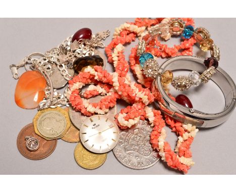 A SELECTION OF JEWELLERY, to include a DKNY bangle watch, a sterling silver curb link chain  and a collection of coins, stamp