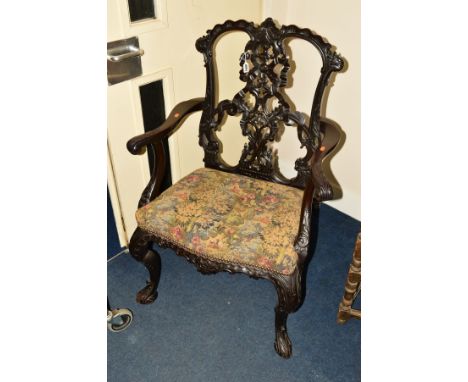 A 20TH CENTURY MAHOGANY CHIPPENDALE STYLE CARVER CHAIR, with heavily carved foliate decoration