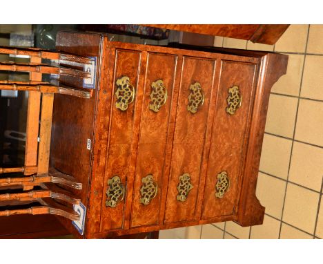 A REPRODUCTION BURR WALNUT AND INLAID GEORGE II STYLE CHEST OF FOUR GRADUATED DRAWERS, with brushing slide, on bracket feet, 