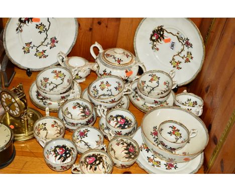 A VICTORIAN PART TEA SERVICE decorated with flowering blossoms on a white ground, painted pattern number 1444 to bottom of so