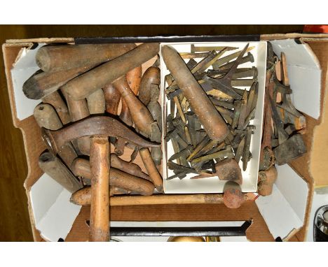 A BOX OF LEATHER CRAFTING TOOLS to include various embossers, rollers, sealers and cutting tools