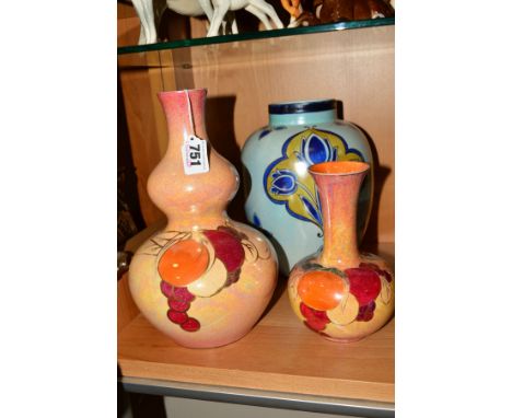 TWO CROWN DUCAL WARE LUSTRE VASES, decorated with fruit, one of double gourd shape, height 27cm, the other height 18.5cm, tog