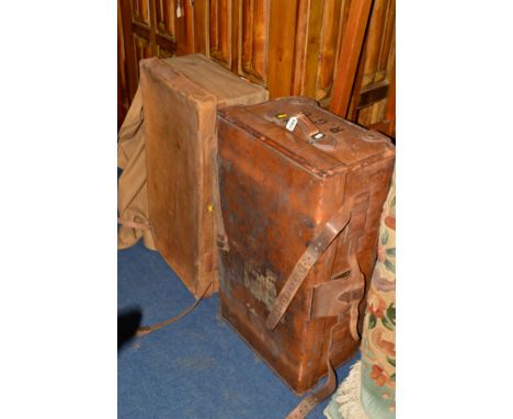 A VINTAGE TAN LEATHER SUITCASE stamped Army and Navy, London to strap, various travel labels width 83cm x depth 47cm x height