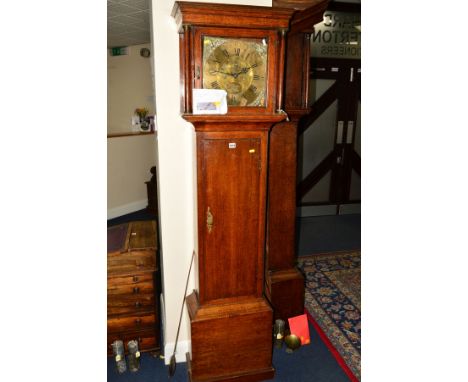 A GEORGE III OAK LONGCASE CLOCK, moulded cornice on brass capped doric columns flanking the hood door, brass dial with silver