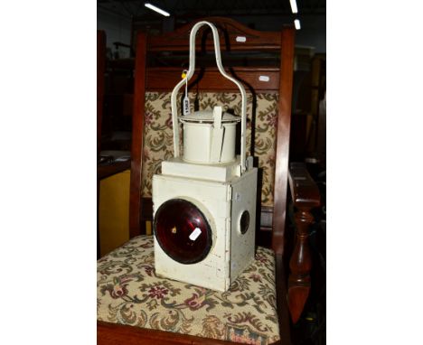 A VINTAGE WHITE PAINTED RAILWAY LAMP