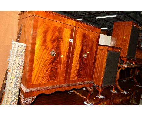TWO MAHOGANY DOUBLE DOOR CABINETS, together with a pair of matching speaker cabinets (4) 