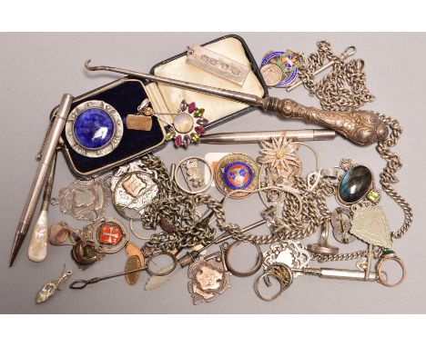 A PARCEL OF SILVER FOBS, chains, ingot, cufflinks, propelling pencils, various earrings, rings, dressing table requisities, t