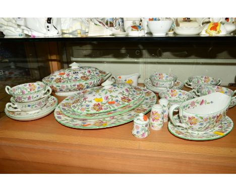 MINTONS 'HADDON HALL' PART DINNERWARES, B1451, to include covered tureen and a tureen lid, two graduating meat platters (one 