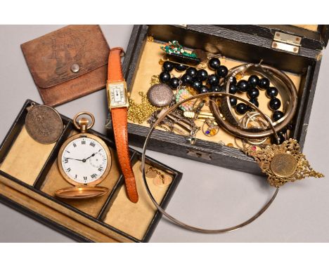 A SMALL JEWELLERY BOX containing a gold plated pocket watch, a coin set brooch, beaded necklace, gold plated cufflinks and fu