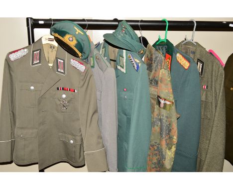 FIVE ITEMS OF GERMAN MILITARY UNIFORMS, uniform jacket marked inside NVA, K, 48, 1850, T/1, the jacket has Overoff &amp; Co 2
