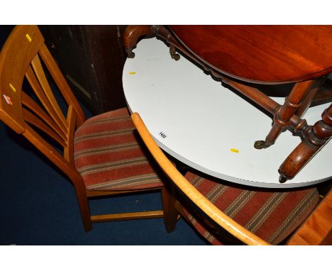 A CIRCULAR WHITE TOPPED TABLE on chrome base together with four light oak dining chairs (5)