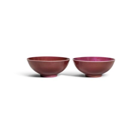 A PAIR OF RUBY-ENAMELLED BOWLSGuangxu six-character marks and of the periodEach of rounded sides rising from a short slightly