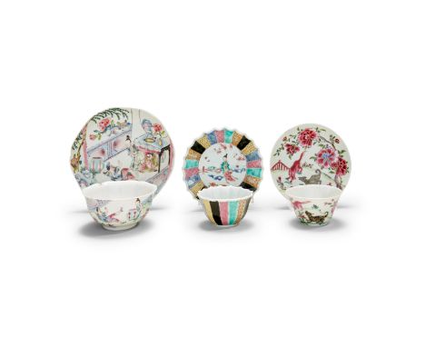 THREE SETS OF FAMILLE ROSE CUPS AND SAUCERSYongzhengOne fluted with gilt and polychrome border panels enclosing a scene of a 