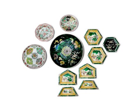 A GROUP OF FAMILLE VERTE DISHES AND SEVEN SWEET MEAT DISHESKangxiComprising: a famille noire dish with panels of lotus, chrys