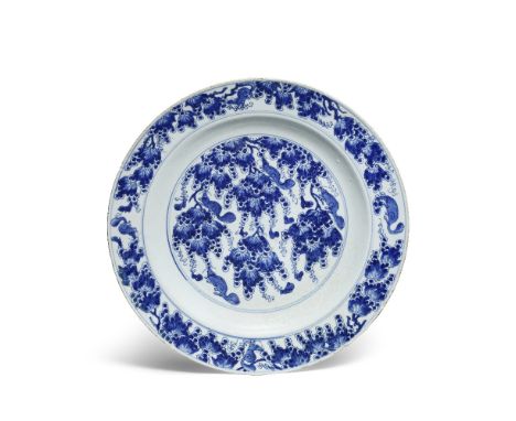 A LARGE BLUE AND WHITE 'SQUIRREL AND GRAPEVINE' DISHKangxiBoldly painted with squirrels clambering amongst pendent fruiting g