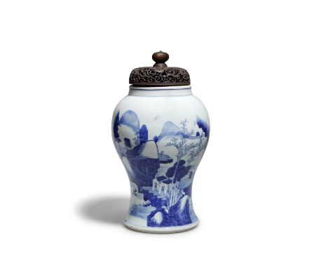 A BLUE AND WHITE 'LANDSCAPE' BALUSTER VASEKangxiDecorated with figures before retreats in a mountainous tree-strewn river lan