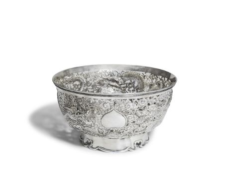 A LARGE CHINESE EXPORT SILVER 'DRAGON' BOWLWang Hing, Hong Kong, circa 1900, stamped WH, character mark and 90Set on a flared