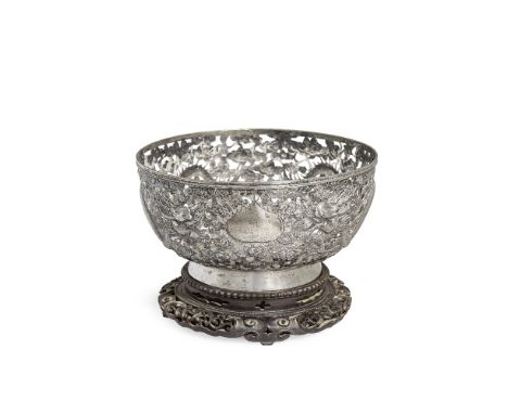 A CHINESE EXPORT SILVER PIERCED 'DRAGON' BOWLLuen Wo, Shanghai, circa 1900The bowl with deep rounded sides, resting on a spla