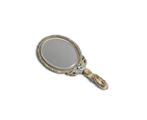 A JADE 'HORSE AND MONKEY' BELT HOOK MOUNTED IN AN ENAMELLED SILVER MIRRORQing DynastyThe terminal carved with a detailed hors