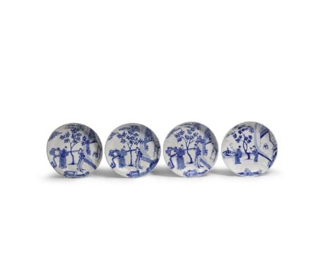 FOUR BLUE AND WHITE FIGURATIVE DISHESKangxi six-character marks and of the periodEach with a barbed rim and lobed sides, deco