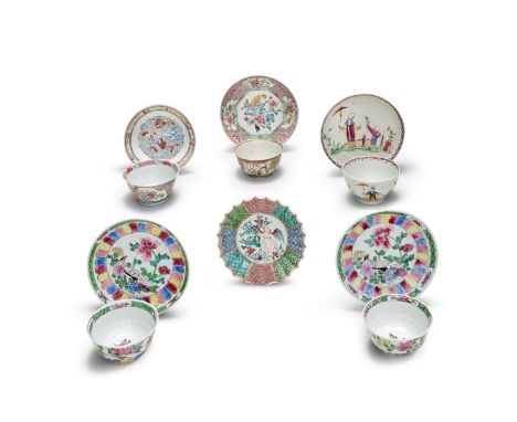 A GROUP OF FAMILLE ROSE CUPS AND SAUCERSYongzheng-QianlongComprising: a pair with moulded petal form borders enclosing exotic