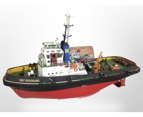 A remote control scale model of a trawler marked 'Smit Nederland', length 85cm.