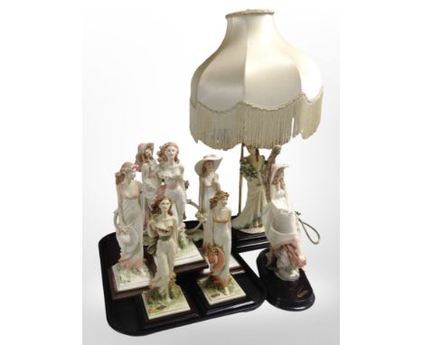 A group of Italian figurines of ladies on plinths, and a further table lamp with tasselled shade.