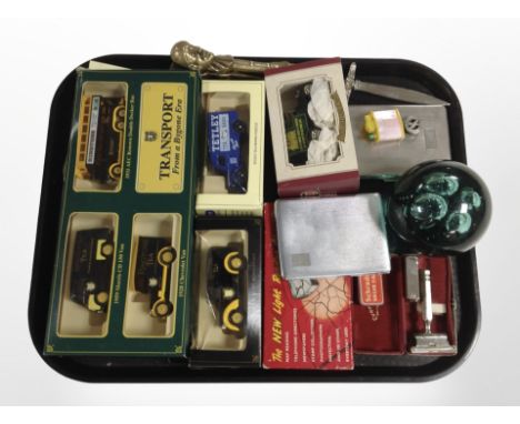 A group of die-cast cars including Ringtons, together with a green glass paperweight, two cigarette cases, Ever Ready razor i