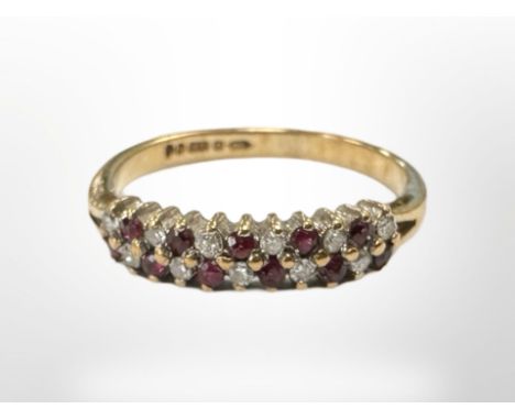 A 9ct yellow gold ruby and diamond ring, size I/J. CONDITION REPORT: 1.5g.