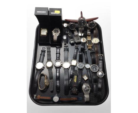A collection of lady's and gent's wristwatches including Timex, Sekonda, Pulsar, together with a desk timepiece in the form o