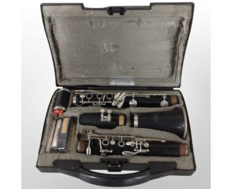 A Corton clarinet, in fitted case.