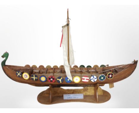 A scale model of a Viking longship, circa 900 AD, on stand, length 113cm.