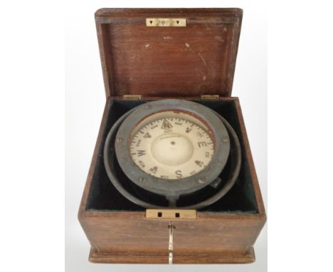 A Sestrel ship's compass in oak case.