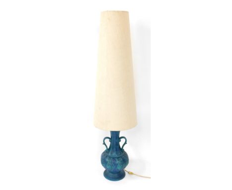 A Western Germany turquoise table lamp, with two handled vase and cream shade, the base 41cm high. (AF)WARNING! This lot cont