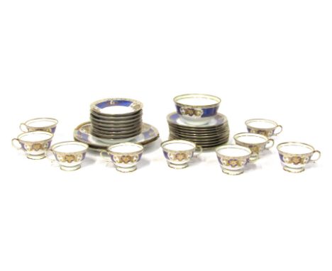 A Noritake part tea service, comprising two cake plates, nine teacups, eight saucers, eight side plates and a sugar bowl. (1 