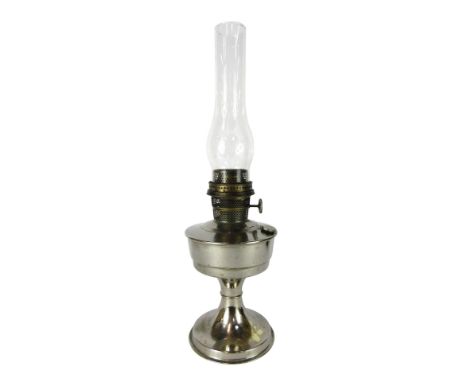A 1930's Super Aladdin chrome plated oil lamp, with glass funnel on a stepped base, 28cm high.