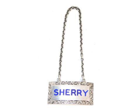 A silver rectangular decanter label, with blue enamel decoration 'Sherry', Birmingham 1979, ¾oz. 